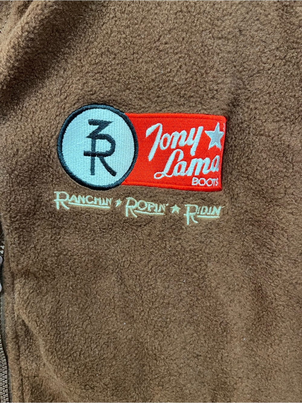 Tony Lama Brown Fleece Jacket with Red and Light Blue Patch